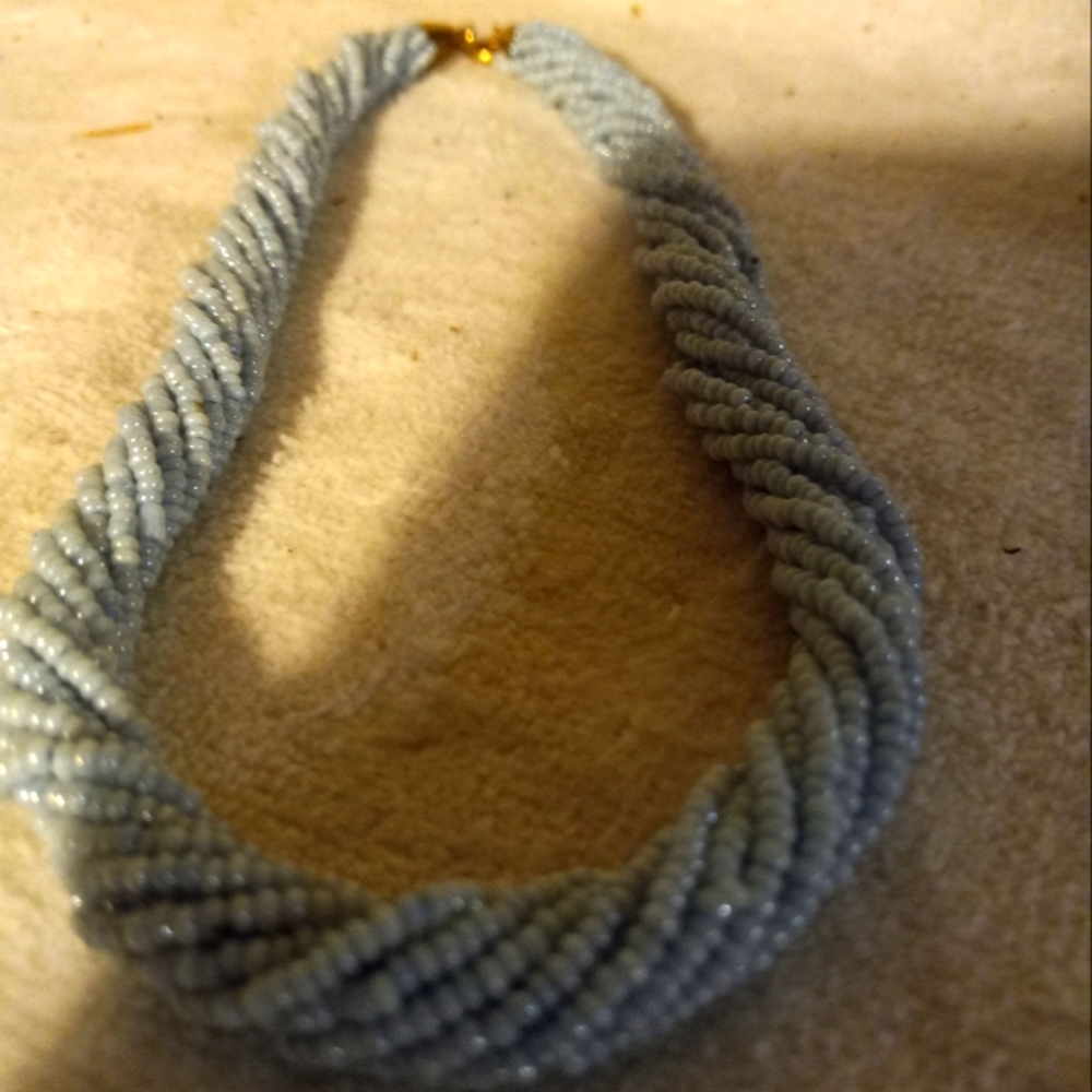 Used,not used seed beads twisted choker length  blue necklace .